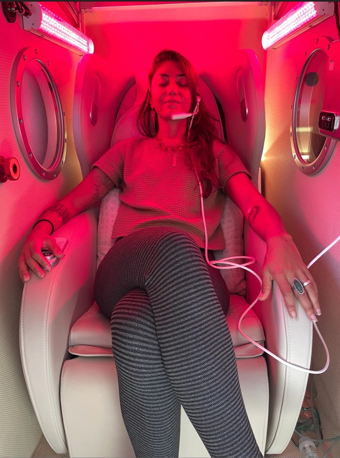 Inside the hyperbaric chamber — a red-light session with oxygen